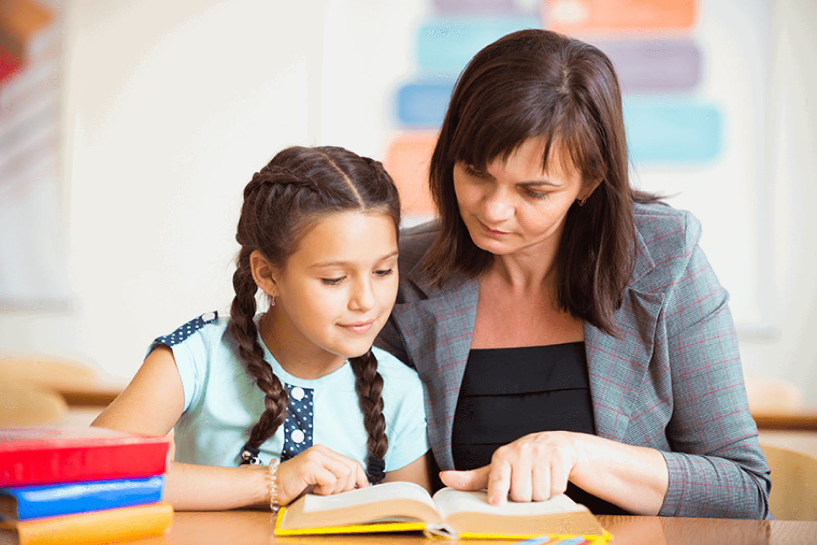 Teacher And Student Reading